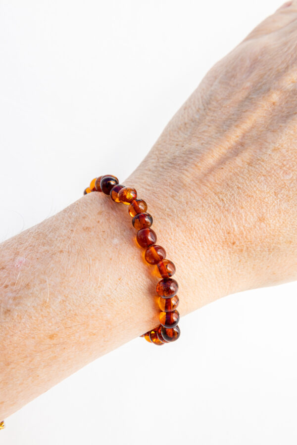 Barnsteen (Amber) cognac kralenarmband (ovaal) 7 mm